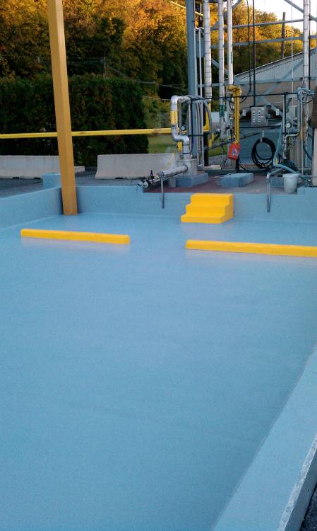 Yellow detailing was added to delineate stairs and wheel chock areas.