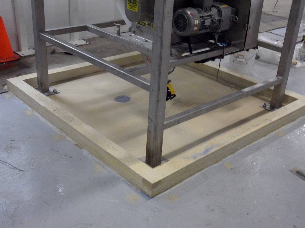 The berm is now ready for coating. Note the careful drain sloping.