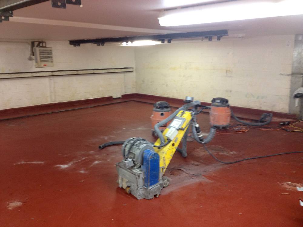 Existing coating over brick floor in the proofer room had failed allowing bubbling to occur.