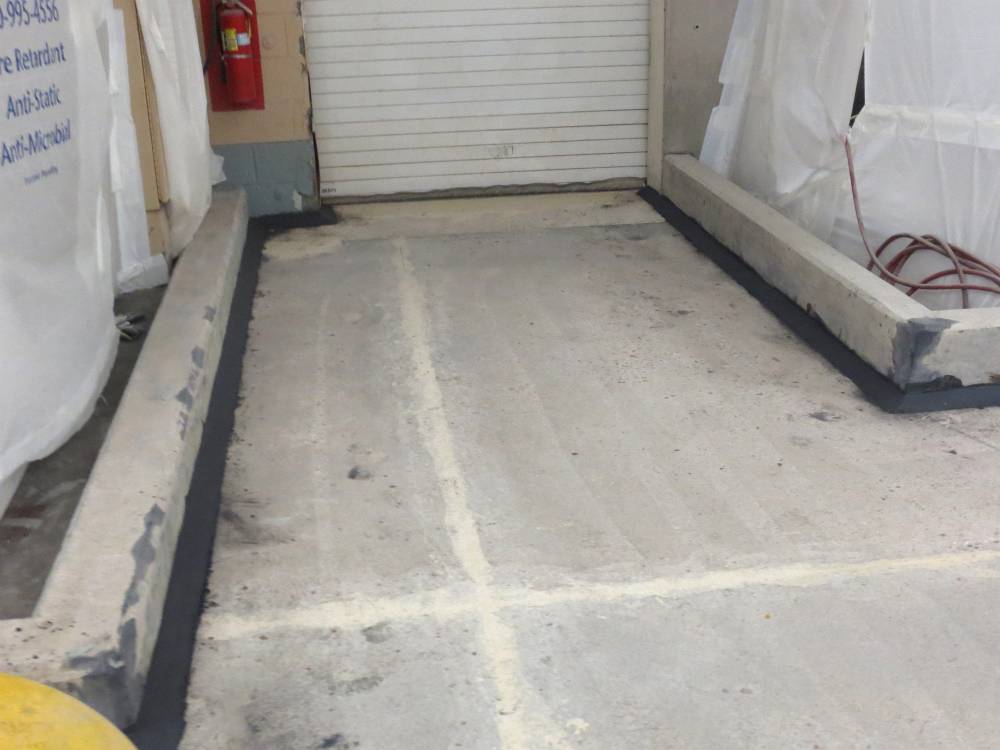 Here you can see repairs on the berms and concrete draw lines.