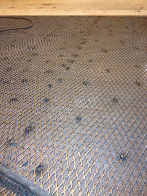 PermaFloor devised a solution by welding a metal screen to the deck which then allowed the urethane concrete to form a strong bond.