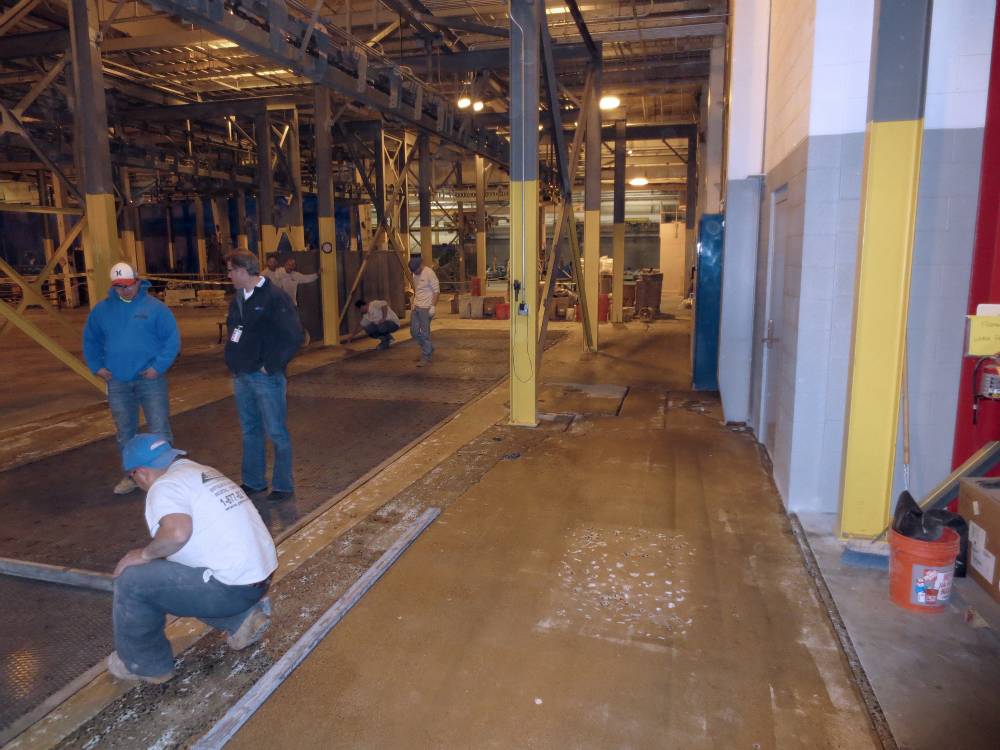 Urethane concrete was the desired solution, however bonding to a metal deck is challenging. 