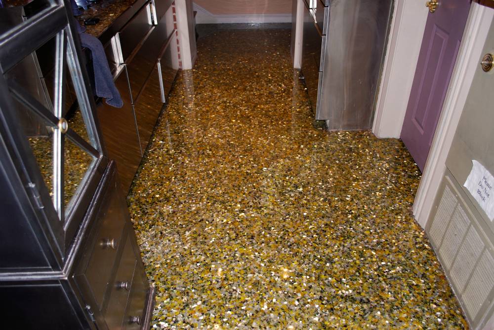 PermaFloor created this floor effect using recycled glass and crushed mirrors suspended in a deep gloss urethane.